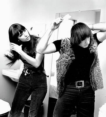 Duo Styling Their Hair Together Wall Art