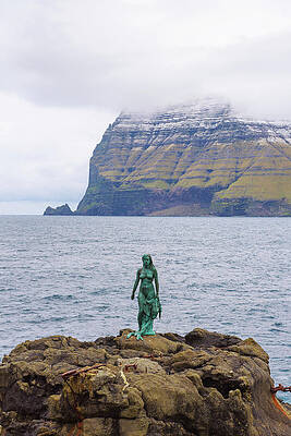 Statue of Selkie or Seal Wife in Mikladalur, Faroe Islands by Miroslav Liska