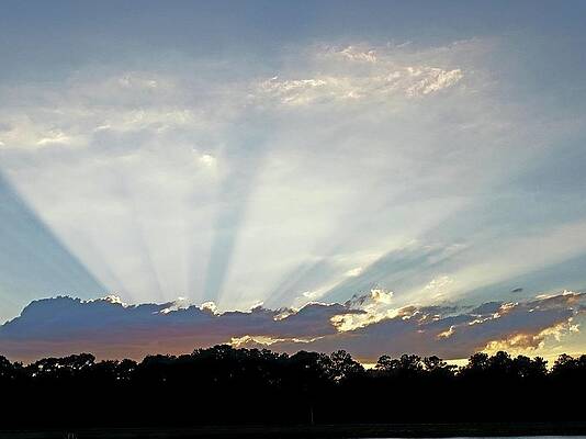 Wall Art featuring the photograph Sun Ray Sunset by Karen Stansberry