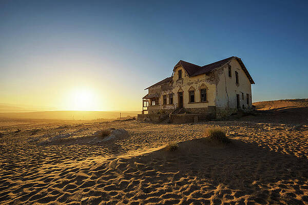 Sunrise Wall Art featuring the photograph Sunrise Above An Abandoned House In Kolmanskop Ghost Town, Namibia by Miroslav Liska
