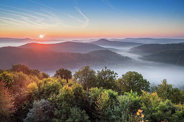 Atmospheric Wall Art featuring the digital art Sunrise Over Mountaintops by Reinhard Schmid