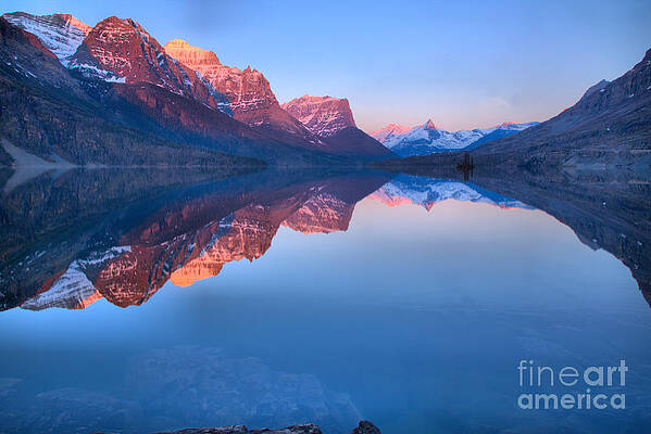 Wall Art featuring the photograph Sunrise Refelctions Across St. Mary Lake by Adam Jewell