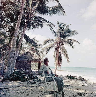 Man Relaxing on Tropical Beach Wall Art