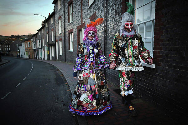 Wall Art featuring the photograph The Annual Lewes Bonfire Night Parade by Dan Kitwood