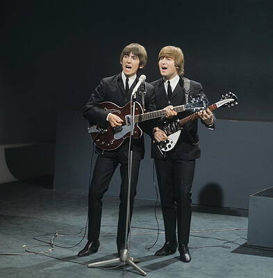 George Harrison and John Lennon Performing Photograph