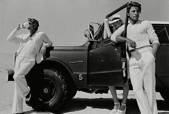 Desert Photograph - Three Models Around A Jeep In The Desert by Stephen Ladner