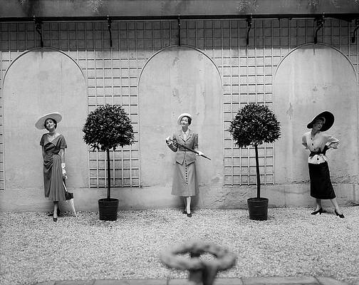 Wall Art featuring the photograph Three Models In The Vogue Paris Office Courtyard by Cecil Beaton
