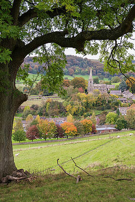 Autumn Wall Art featuring the digital art United Kingdom, England, Derbyshire, Hathersage, Great Britain, Peak District National Park, British Isles, The Village Church Framed By Autumn Oak Tree Branches by Deborah Waters