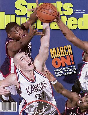 Basketball Players in Intense Action Photograph