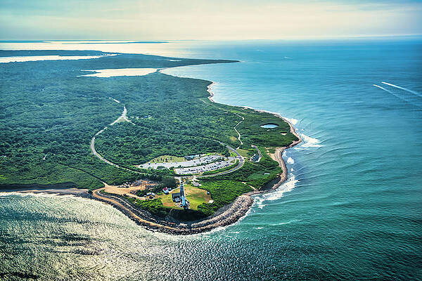 Lighthouse Wall Art featuring the digital art Usa, New York, Long Island, Aerial View Of Montauk Point Lighthouse Surrounded By Green Field And Ocean. by Alejandra Uribe Posada
