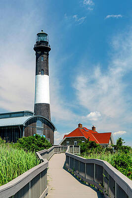 Lighthouse Wall Art featuring the digital art Usa, New York, Long Island, Wooden Path Leading To Fire Island Lighthouse. by Alejandra Uribe Posada