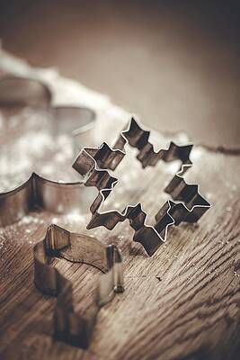 Various Cookie Cutters On A Wooden Background Print