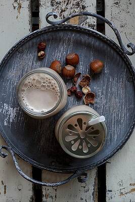 Vegan Hazelnut Milk In Glasses With Lids On A Tray Print