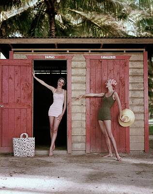 Wall Art featuring the photograph Women Outside Changing Rooms At The Beach by Leombruno-Bodi