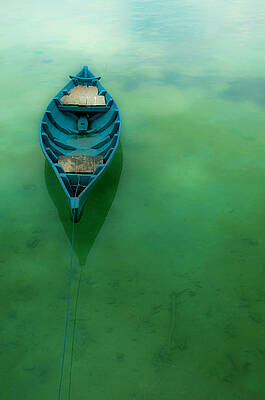 Wall Art featuring the photograph Wooden Boat On Crystal Clear Water by Zuraisham