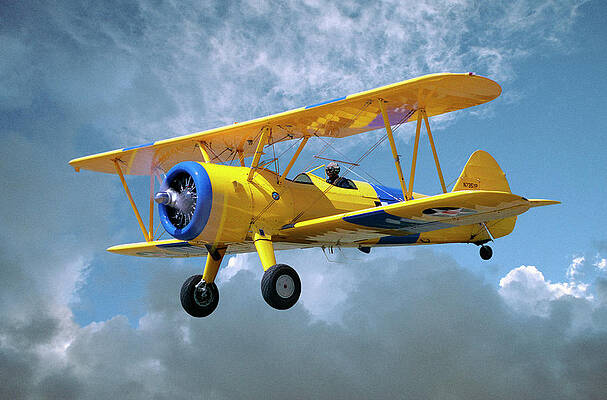 Wall Art featuring the photograph Yellow Stearman 5yp Bi-plane Flying In by Diane Miller