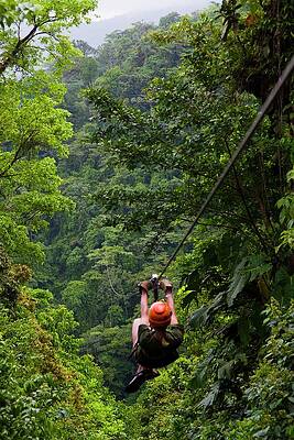 North America Wall Art featuring the digital art Zip Lining by Aldo Pavan
