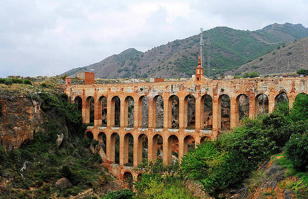 Sky Wall Art featuring the photograph Arc Old Bridge In South Spain #1 by Severija Kirilovaite