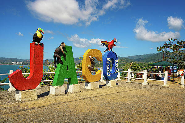 Travel Wall Art featuring the photograph Colorful Entry Sign For The City Of Jaco In Costa Rica #1 by Miroslav Liska