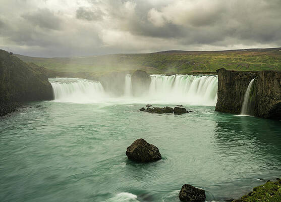 Majestic Waterfall Under Gray Skies Wall Art