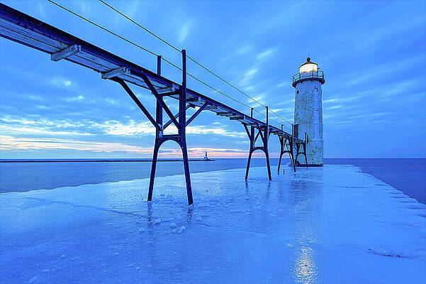 Blue Lighthouse at Dusk Photograph