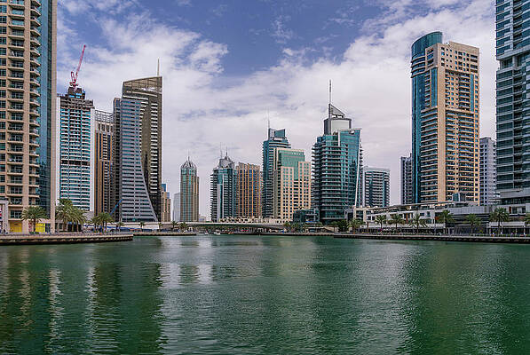 Modern Wall Art featuring the photograph Modern Buildings Crowd The Waterfront At Dubai Marina UAE #1 by Steven Heap