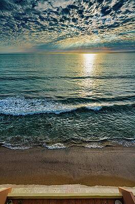 Sunset Over Tranquil Waves Photograph