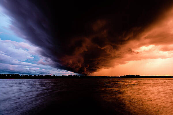 Dramatic Storm Over Water Photograph