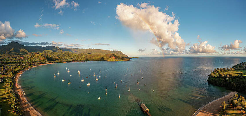 Wall Art featuring the photograph Rainbow Over Hanalei Bay In Panorama Across The Ocean #1 by Steven Heap