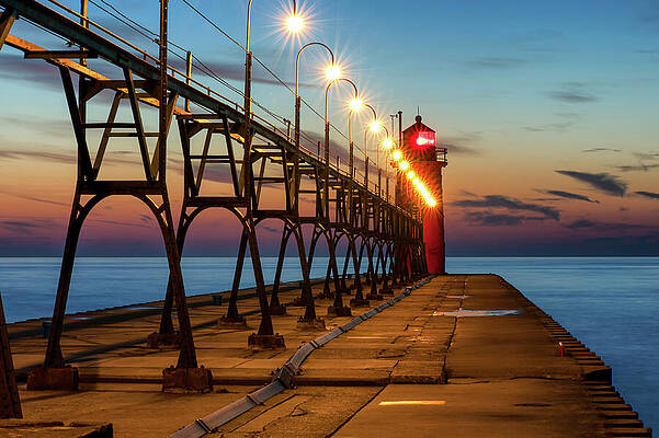 Photograph - South Haven South Pier Light After Sunset #1 by Michael Collins