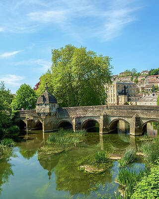 Historic Bridge Over Reflective River Photograph