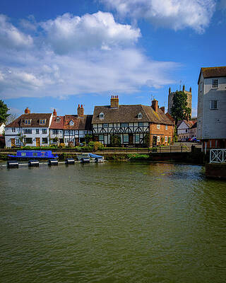Charming Riverside Village Scene Photograph