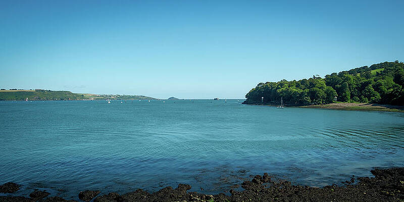 Serene Coastal View with Clear Skies Wall Art