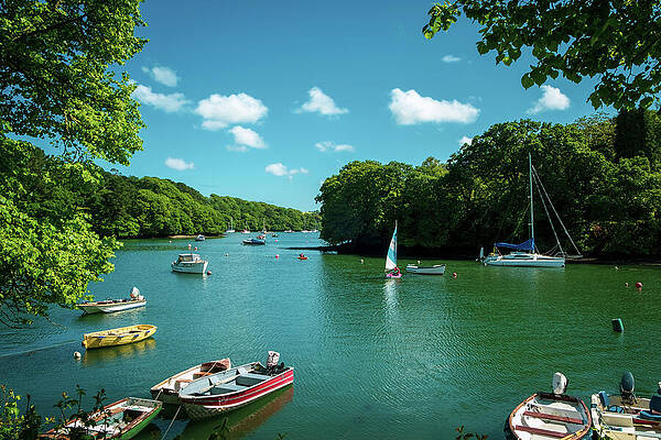 Tranquil River with Boats Photograph