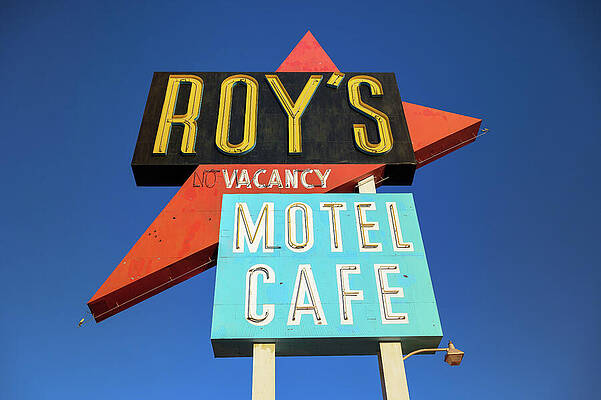 Vintage Wall Art featuring the photograph Vintage Neon Sign Of Roy's Motel And Cafe On Route 66 #3 by Miroslav Liska