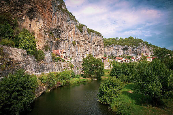 Charming Village by Cliffside River Photograph