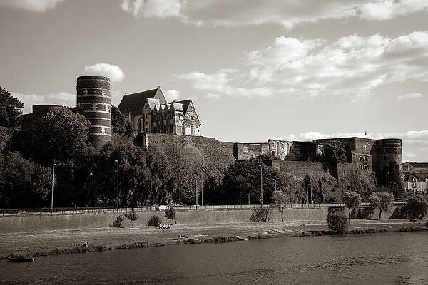 Historic Castle by the River Photograph