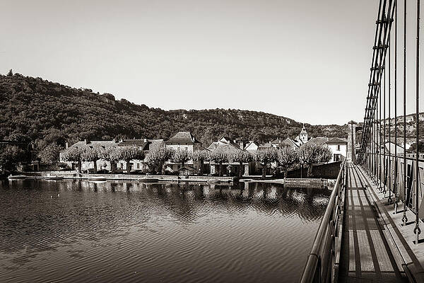 Serene Riverfront Village Scene Photograph