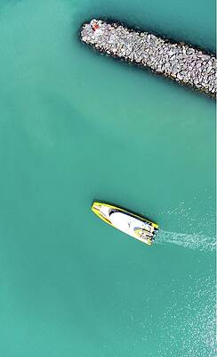 Beautiful Wall Art featuring the photograph A Boat Heading Out Of Harbour In Whitsundays, Australia by Andre Petrov