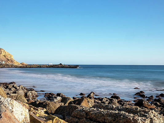 Wall Art featuring the photograph A Glazy White Point At Low Tide by Joe Schofield