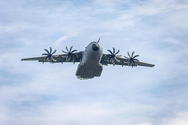 Large Military Aircraft in Flight Photograph