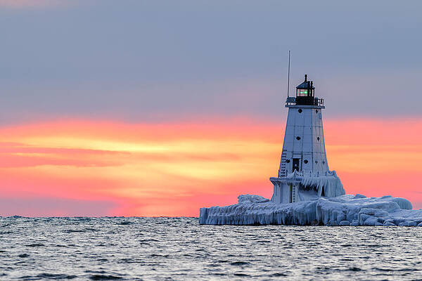 Sunset Wall Art featuring the photograph After Sunset At The Ludington North Pier Light by Michael Collins