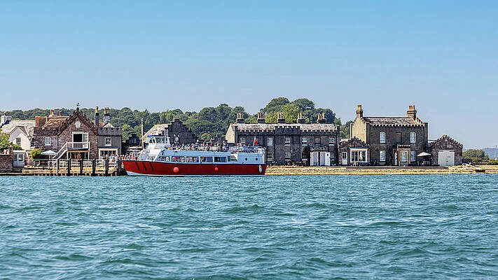 Charming Coastal Village with Ferry Photograph