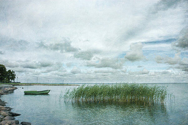 Serene Lakeside Scene with Boat Wall Art