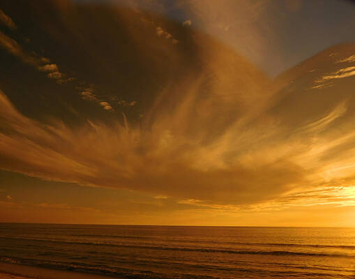 Wall Art featuring the photograph Angelic Sunset by Karen Stansberry