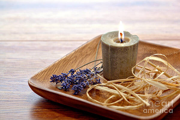 Wall Art featuring the photograph Aromatherapy Candle On Rocks In A Spa by Olivier Le Queinec