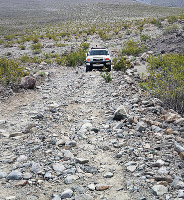 Wall Art featuring the photograph Ascent May Be Steeper Than It Appears by Joe Schofield
