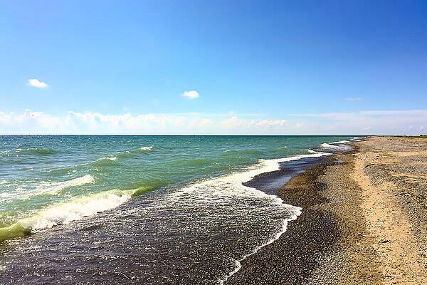 Serene Wall Art featuring the photograph Azure Tranquility Serene Seascape Under A Bright Sky by Travel Essayist
