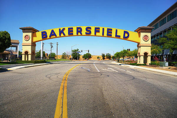Landmark Wall Art featuring the photograph Bakersfield Welcome Sign, A Wide Arched Street Sign by Miroslav Liska