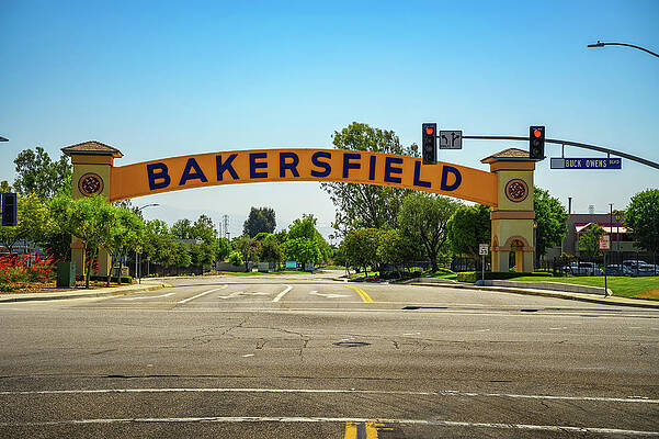 Landmark Wall Art featuring the photograph Bakersfield Welcome Sign Over The Road On A Clear Day by Miroslav Liska
